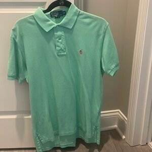 Polo Ralph Lauren polo. Color is close to teal. Logo is pink. Size M